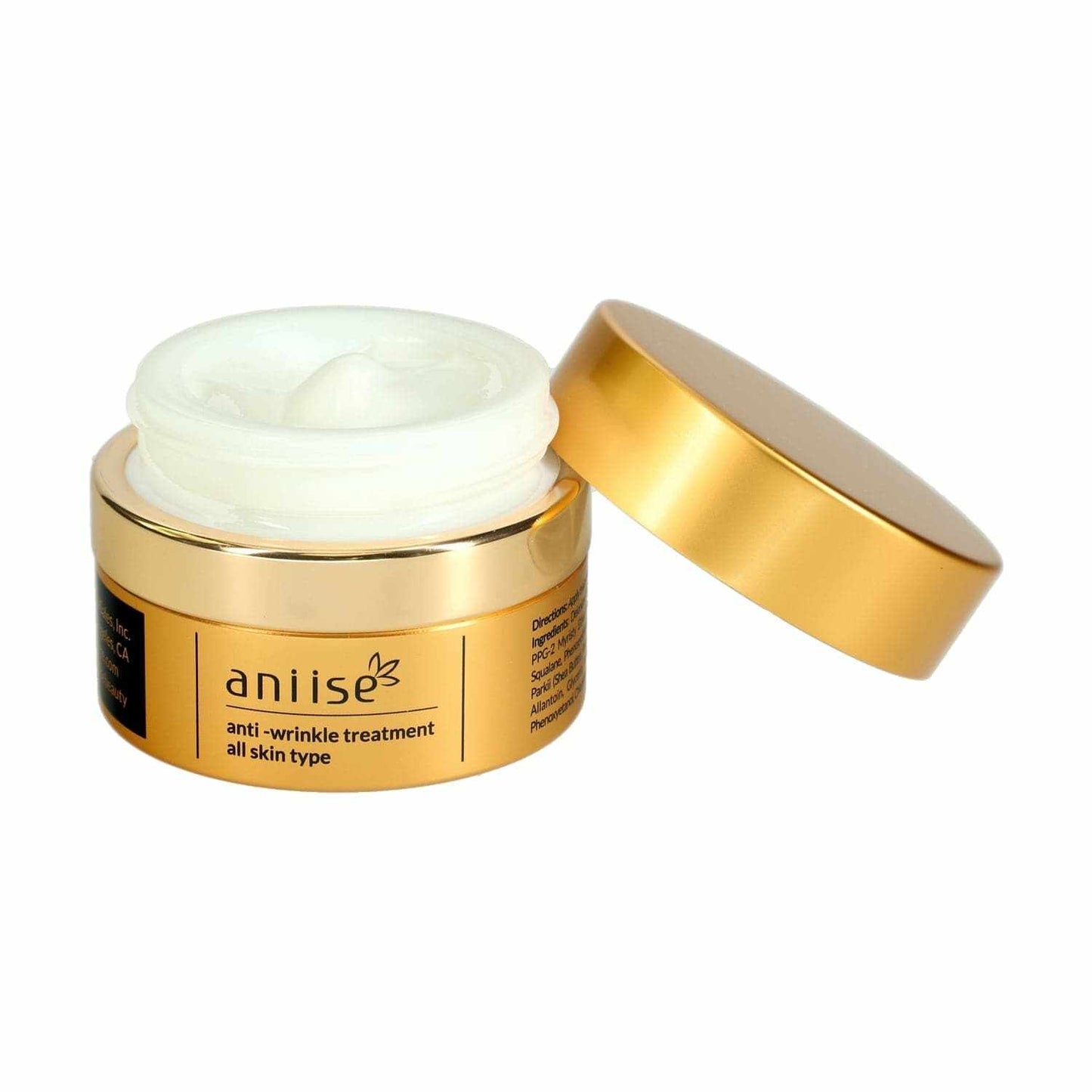 gold jar of Aniise anti-wrinkle treatment cream with open lid showing white cream inside for face and neck skin care