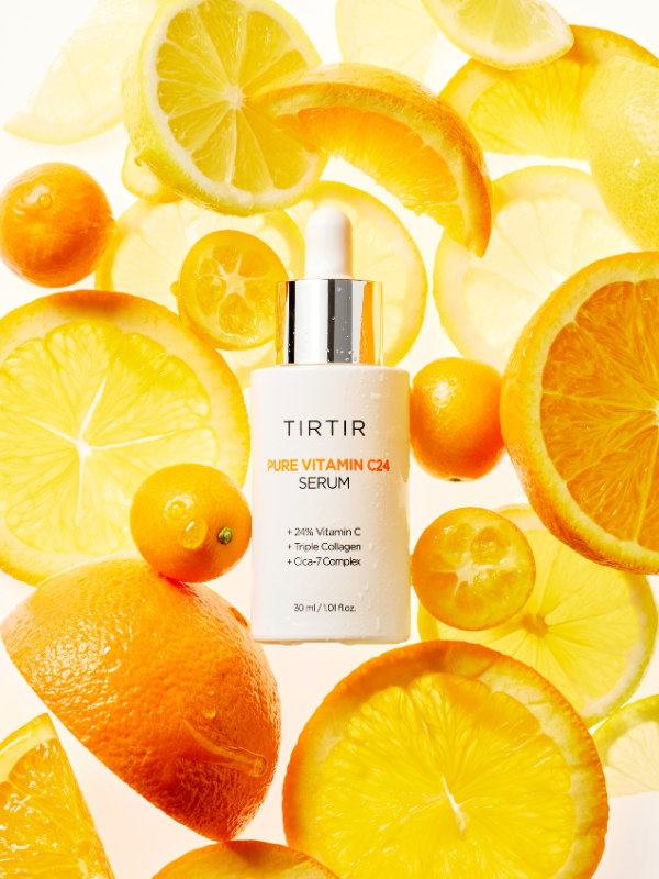 TIRTIR Pure Vitamin C24 Serum bottle surrounded by citrus fruit slices representing vitamin C rich ingredients